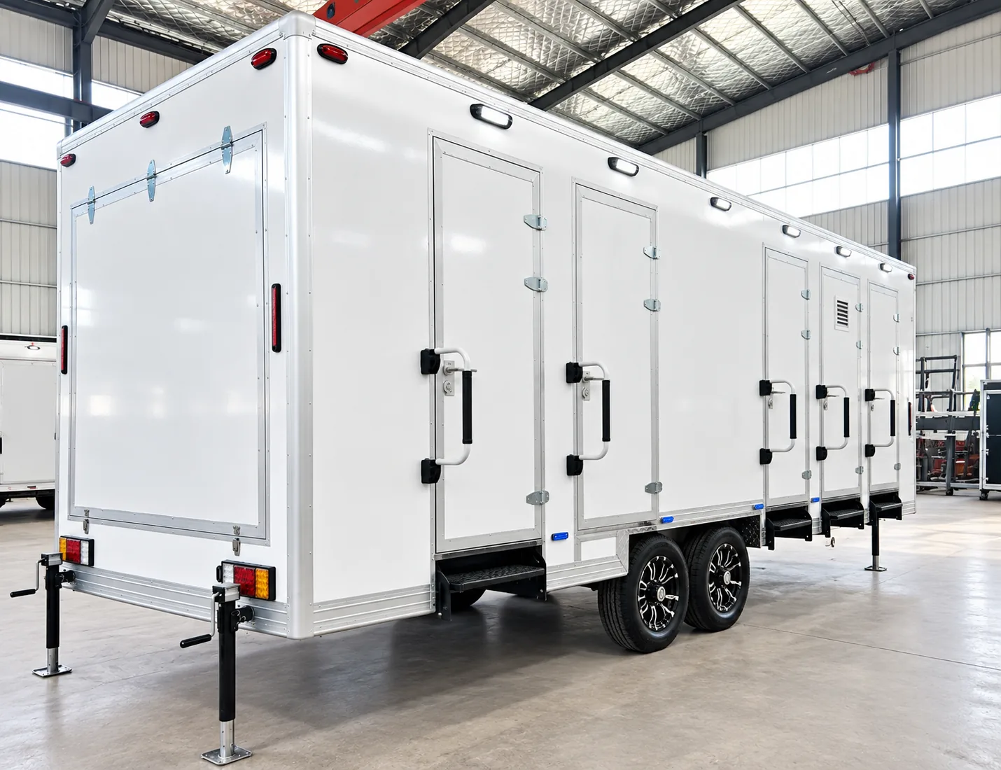 Rear exterior and service area of a shower trailer
