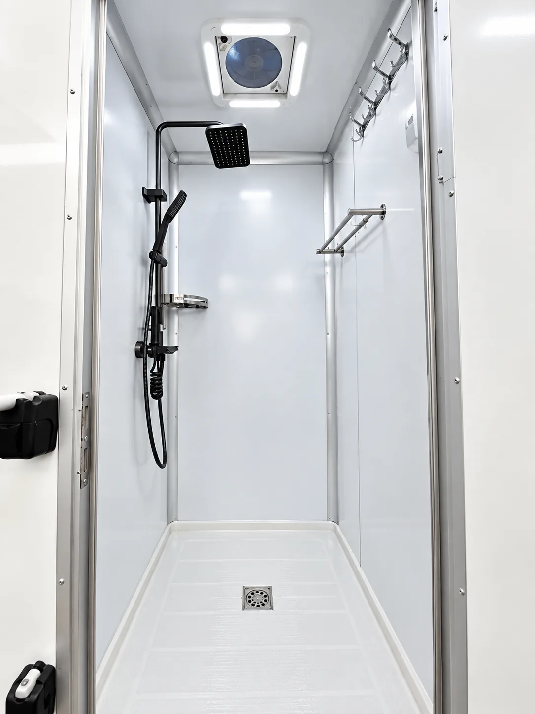 Wash station inside a mobile shower trailer